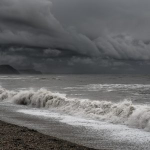 Dramatic stormy cloudscape and waves on Front Beach Lyme Regis 15_11_22