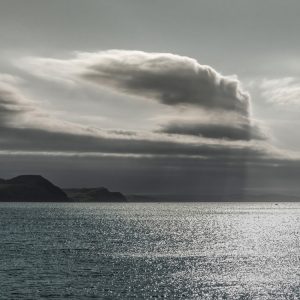 Unusual cloudscape over the sea and coast from Gun Cliff Walk, Lyme Regis 30_08_21 edit pano