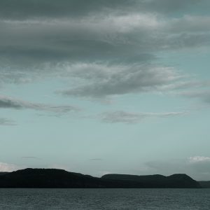 Cloud and blue sky over the silhouetted coast from Gun Cliff, Lyme Regis 26_10_23