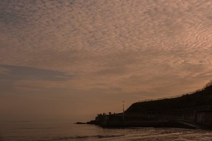 Evening Mackerel sky over Church Cliff and the sea from Church Cliff Walk, Lyme Regis 09_10_23