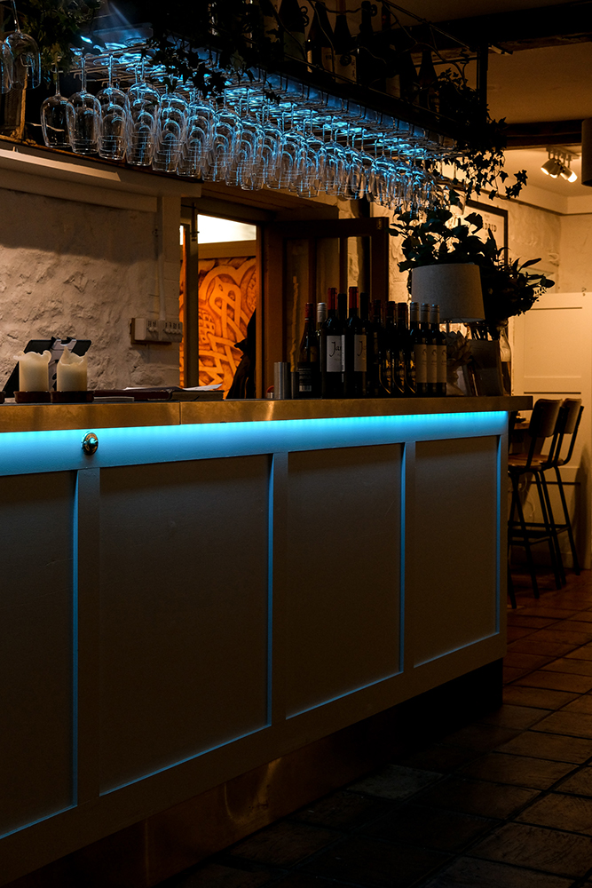 Lyme at night Blue bar lighting in The Strawberry Tree, The Town Mill, Lyme Regis 06_11_22 homeslider