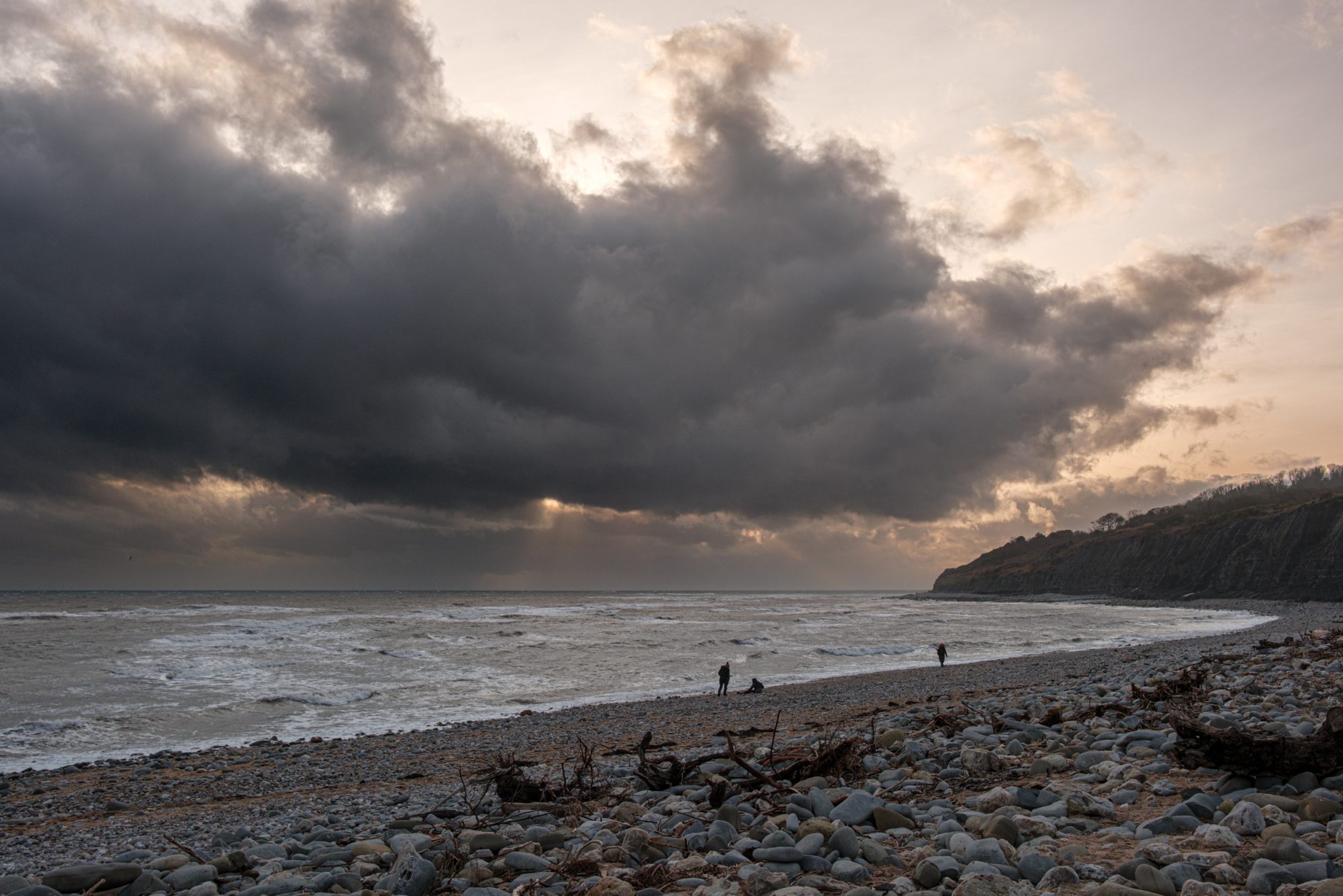 Backlit sunset cloudscape over the sea and coastline from Monmouth Beach Lyme Regis 31_12_24