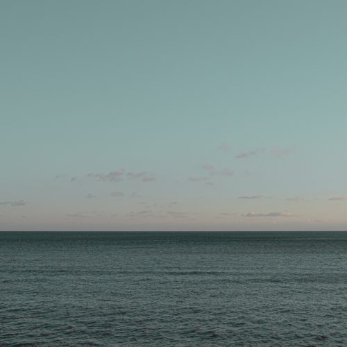 Blue sky and small clouds over the sea from Cart Road Lyme Regis 11_01_24 pano